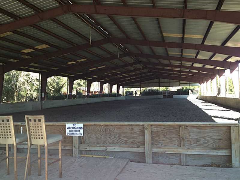 Horse Farm For Sale with 49 stalls, arena, and Cedar Home near Deland, FL - $495,000